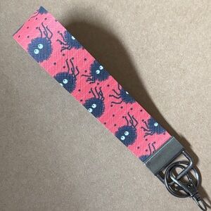 Orange vinyl Keychain with Black Spider Design